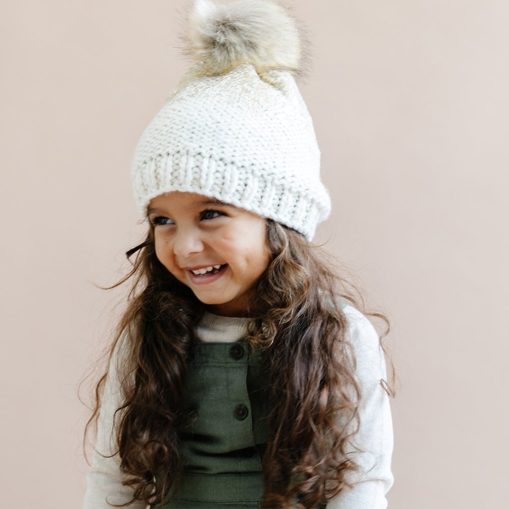 Cream hat with 2024 fur pom pom