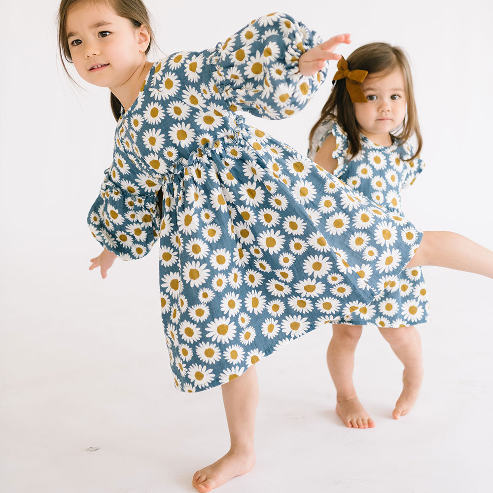 
                  
                    The Bodie Dress in Daisies
                  
                