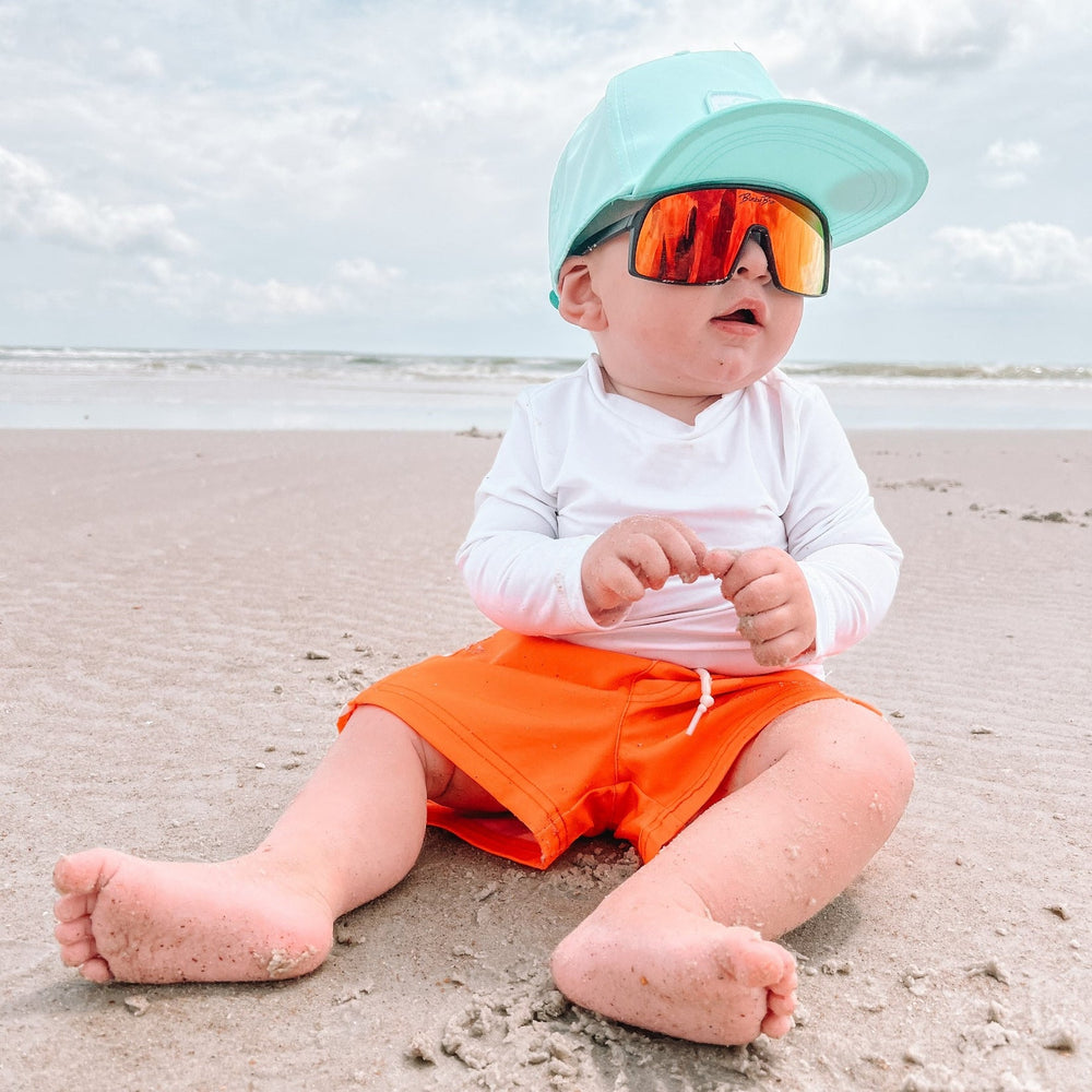 
                  
                    Neon Orange Checkered Swim Trunks
                  
                