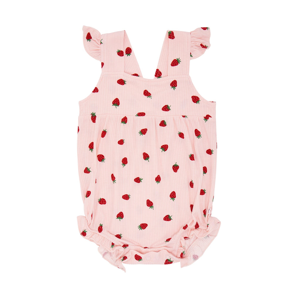 Flat lay of baby girl’s pink ribbed romper with red strawberry print, flutter sleeves, and snap closure at bottom.