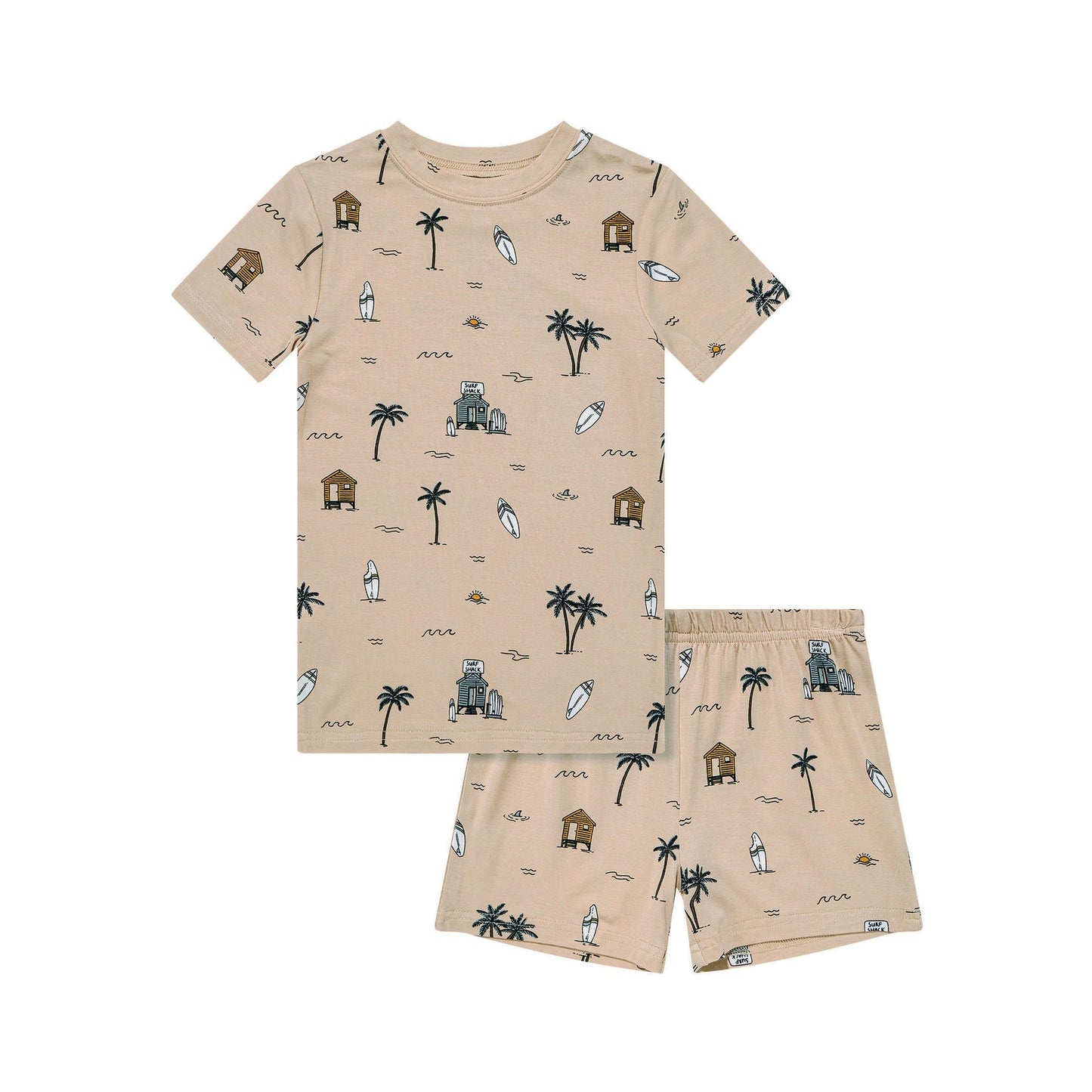 
                  
                    Flat lay of Surf Shack two-piece set for toddlers – tan shirt and shorts printed with palm trees, surfboards, waves, and beach huts.
                  
                