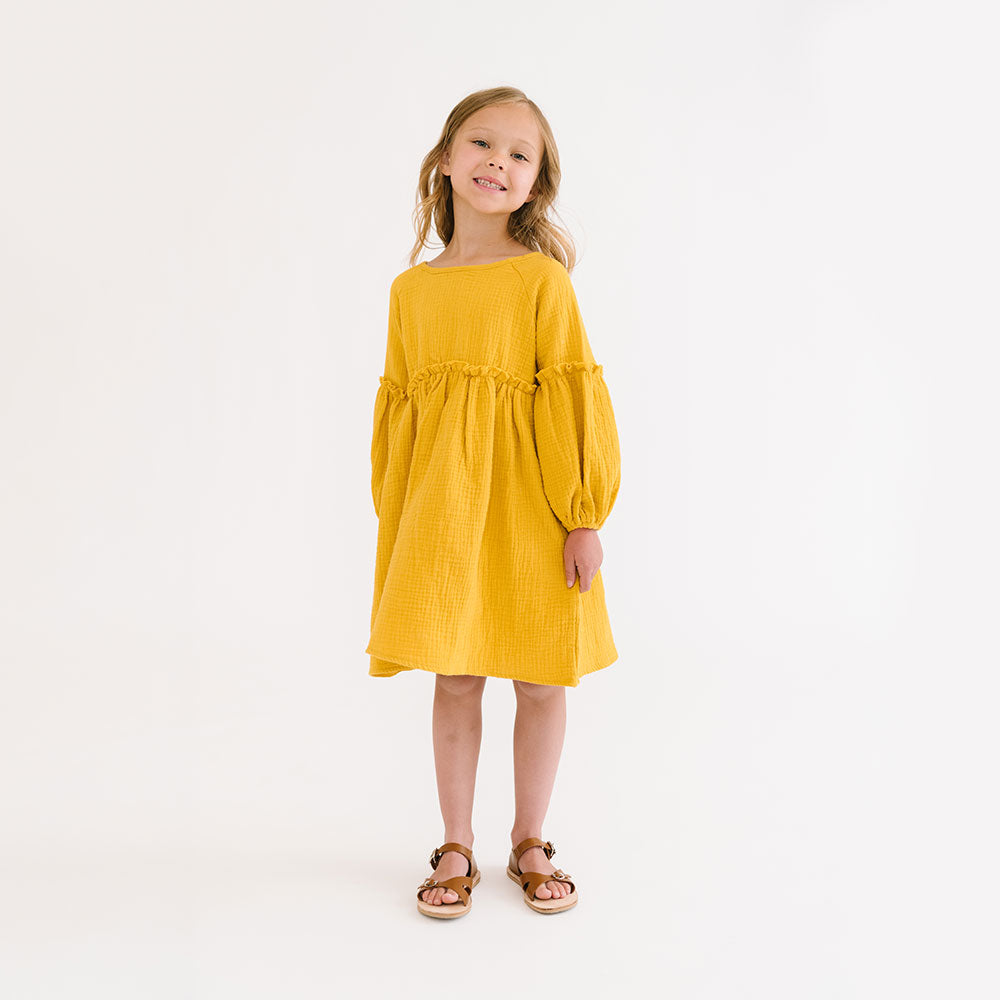 
                  
                    The Bodie Dress in Bronze
                  
                