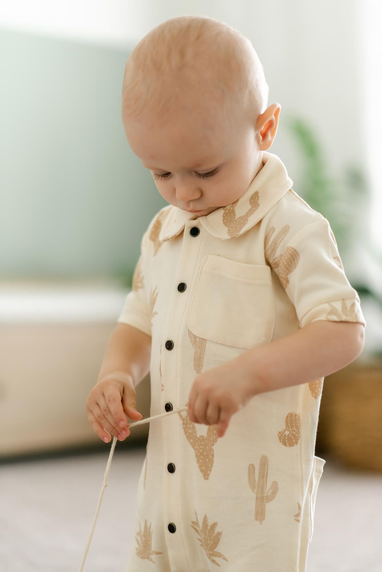 
                  
                    Printed Short Sleeve Coverall in Buttercream Cactus
                  
                