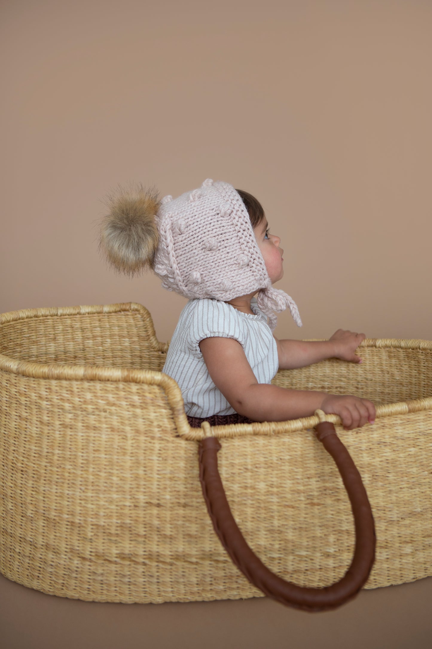 
                  
                    Dusty Rose Coco Bonnet with Pom
                  
                