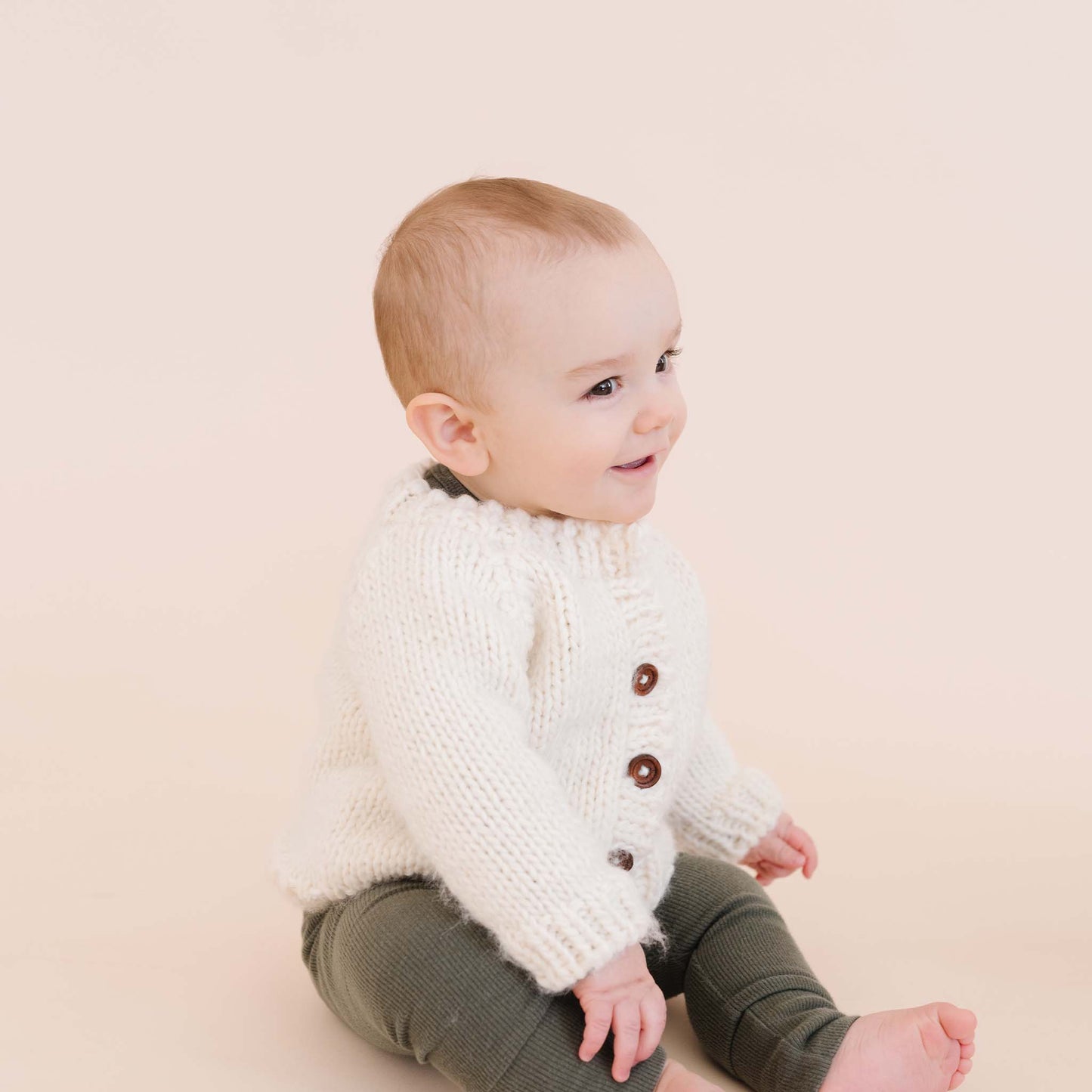 
                  
                    Cream Classic Cardigan
                  
                