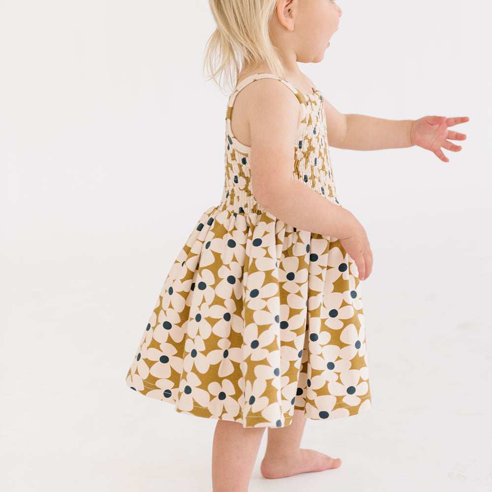 
                  
                    The Baby Smocked Dress in Crowded Petal
                  
                