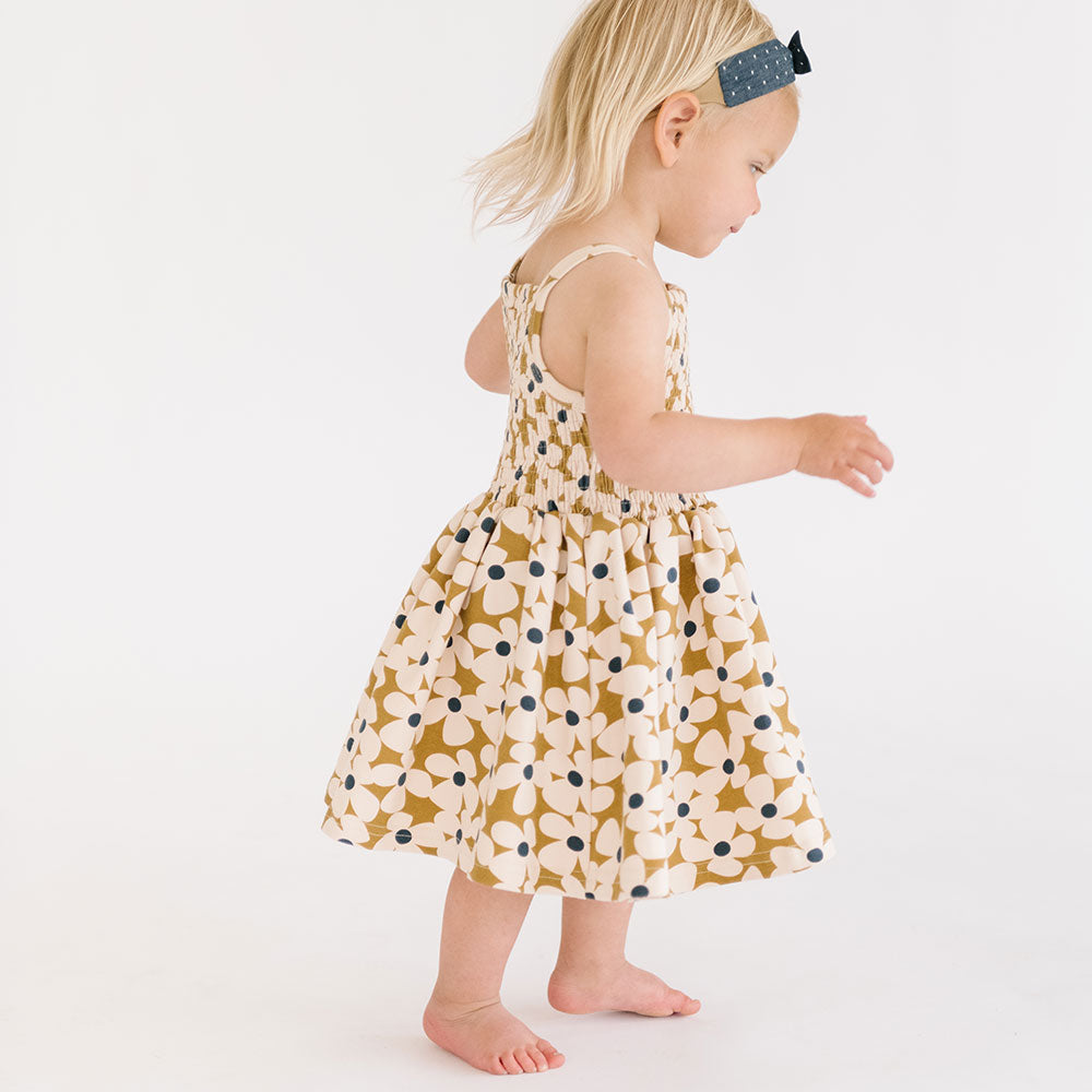 
                  
                    The Baby Smocked Dress in Crowded Petal
                  
                