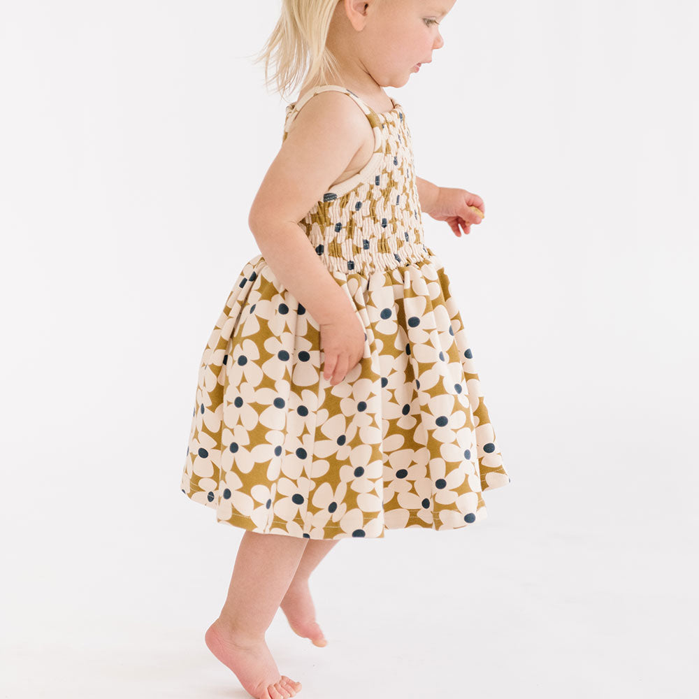 
                  
                    The Baby Smocked Dress in Crowded Petal
                  
                