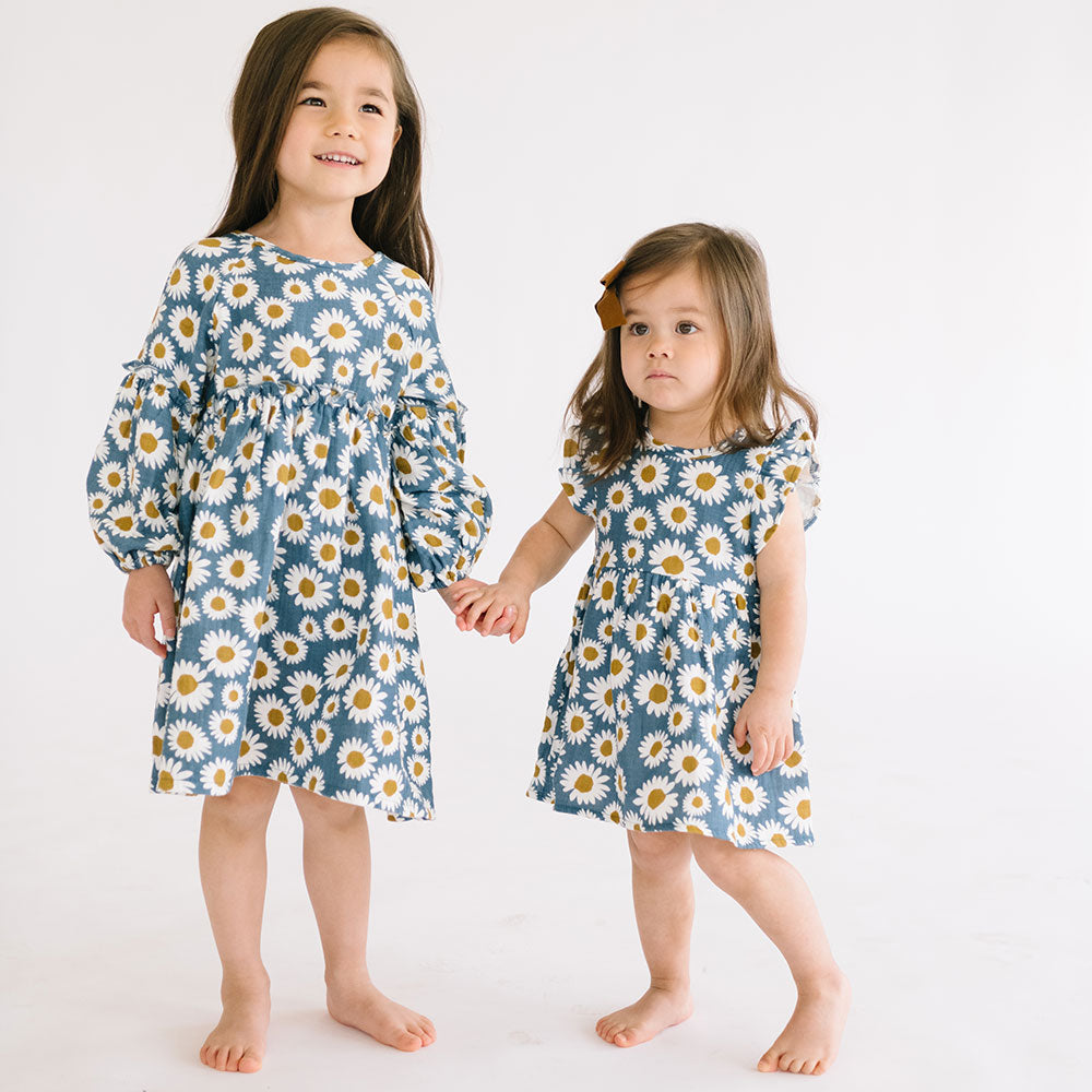 
                  
                    The Bodie Dress in Daisies
                  
                