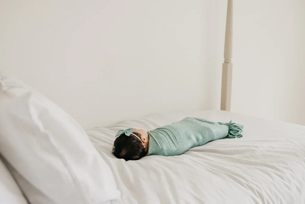 
                  
                    Emerson Knit Swaddle
                  
                