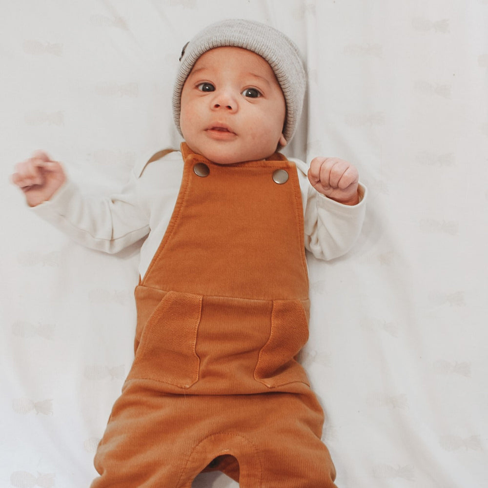 
                  
                    French Terry Overall Romper in Butterscotch
                  
                