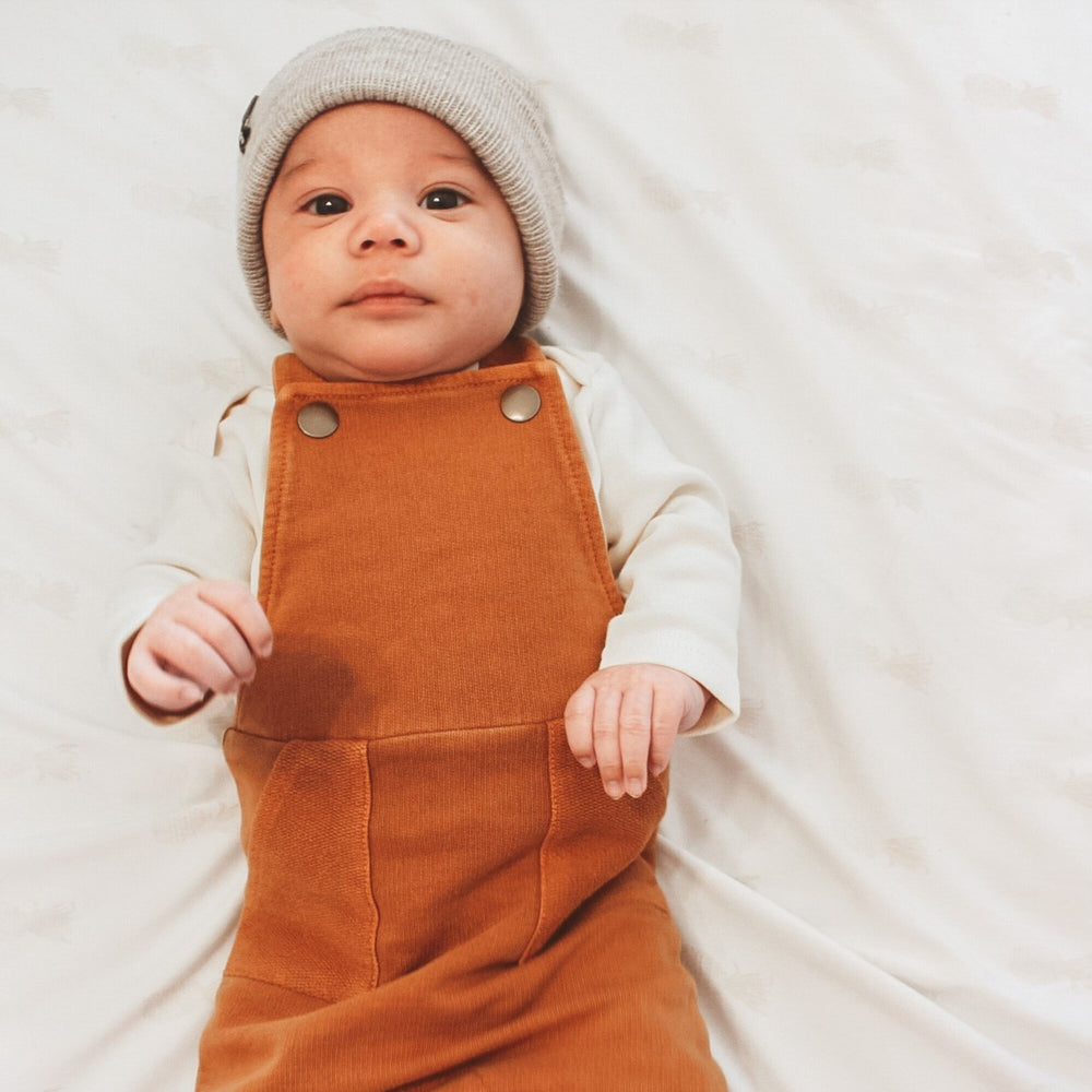 
                  
                    French Terry Overall Romper in Butterscotch
                  
                