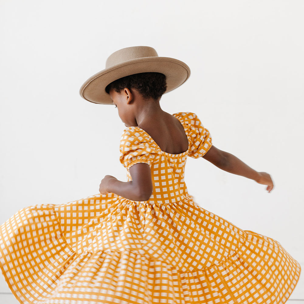 
                  
                    The Juliet Dress in Golden Grid
                  
                