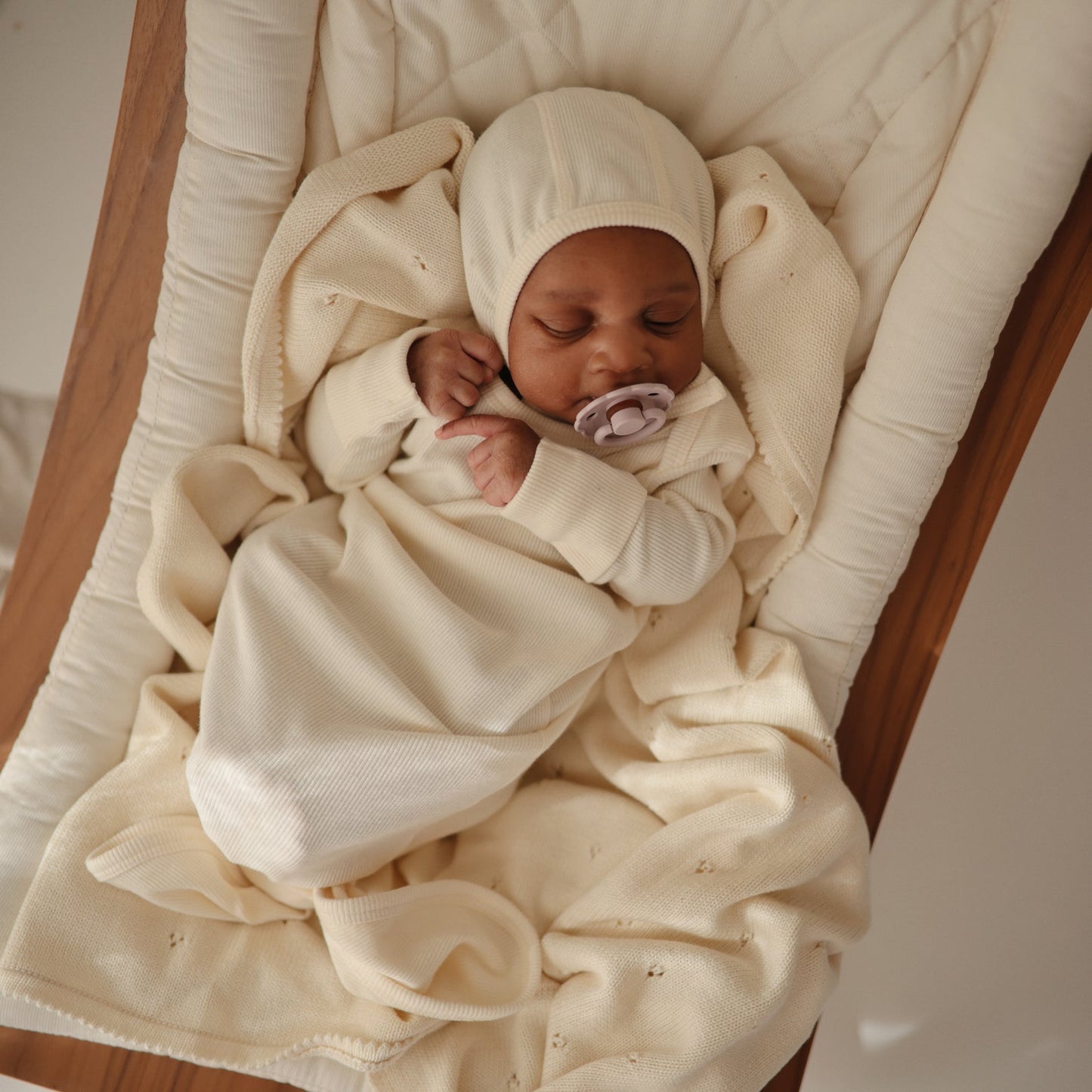 
                  
                    Ribbed Baby Bonnet (Ivory)
                  
                