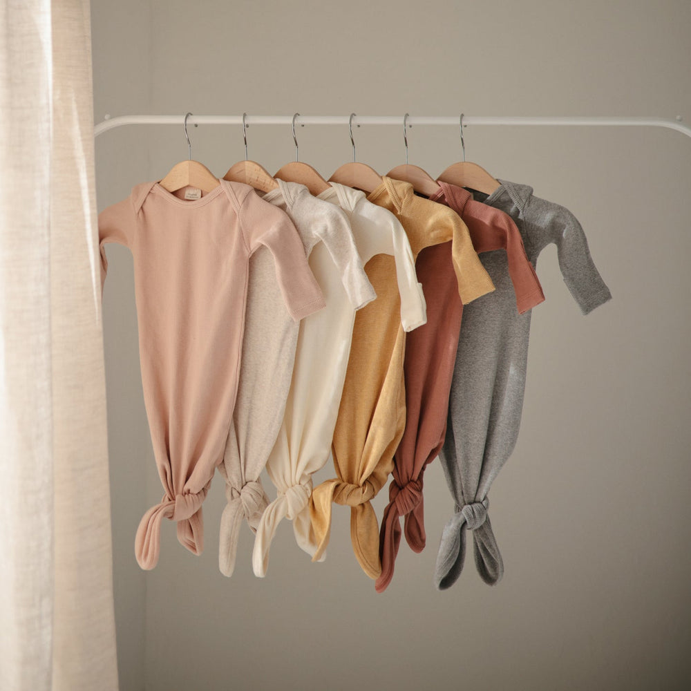 
                  
                    Ribbed Knotted Baby Gown (Beige Melange)
                  
                