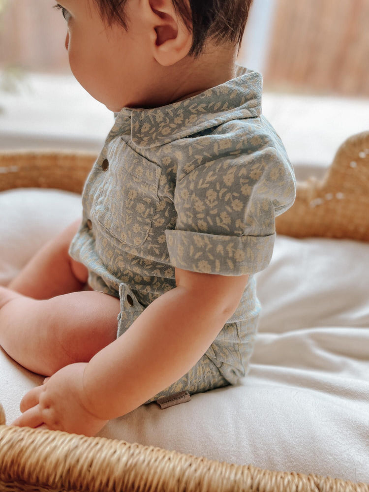 
                  
                    Printed Muslin Short Sleeve Coverall in Lagoon Floral
                  
                