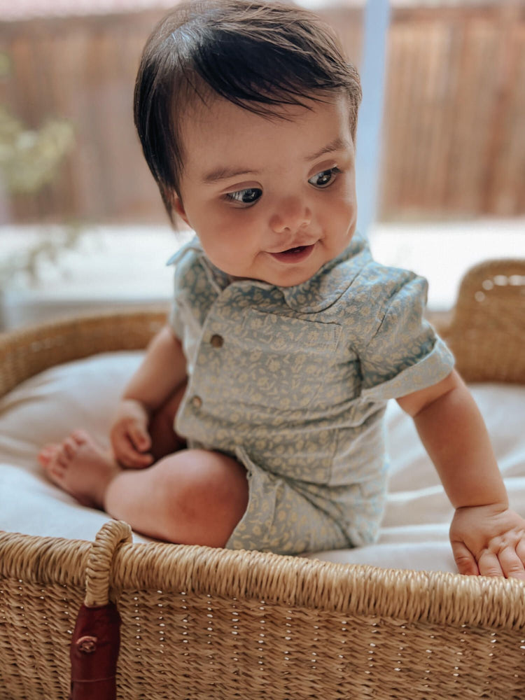 
                  
                    Printed Muslin Short Sleeve Coverall in Lagoon Floral
                  
                