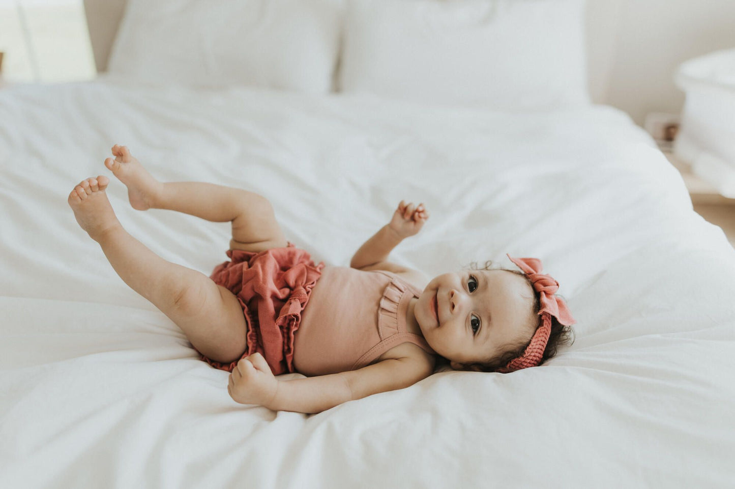 
                  
                    Mauve Ruffle Criss-cross Bodysuit
                  
                