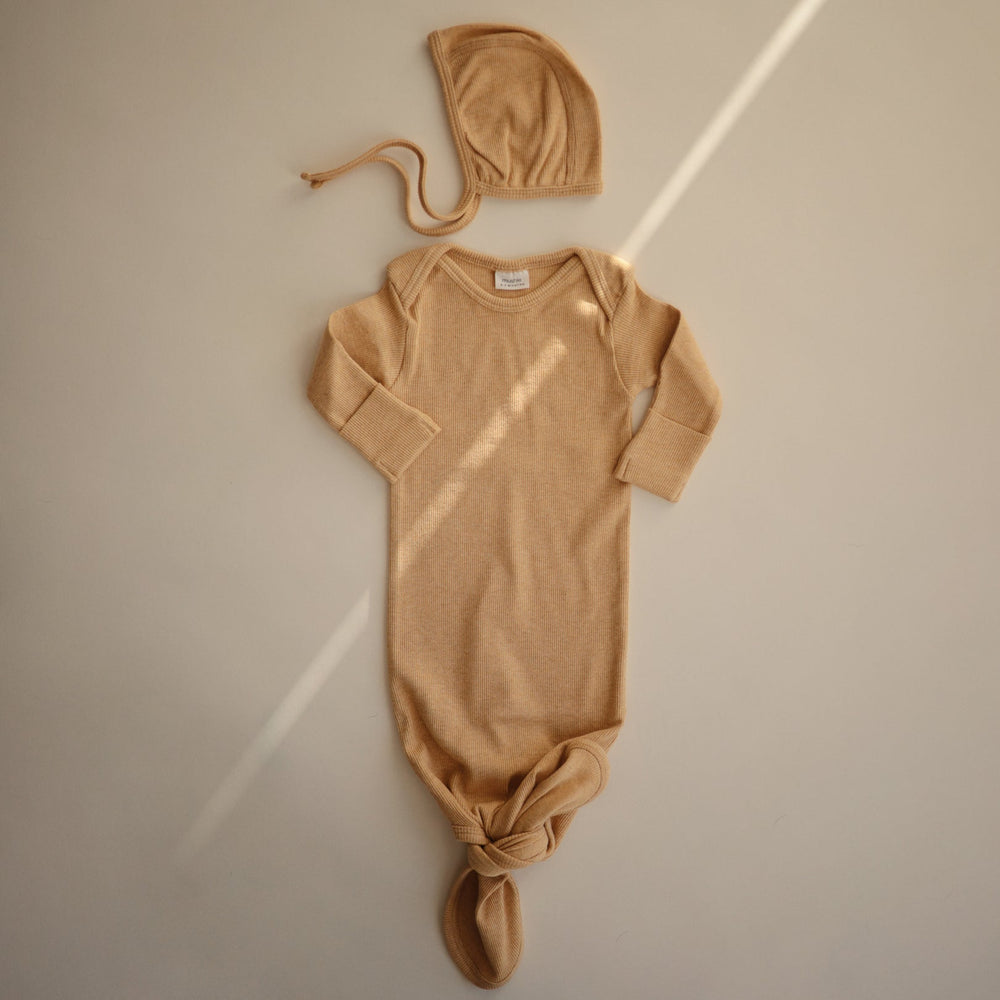 
                  
                    Ribbed Knotted Baby Gown (Mustard Melange)
                  
                