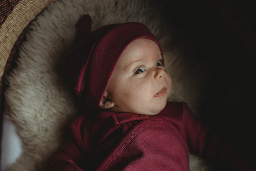 
                  
                    Organic Banded Top-Knot Hat in Appleberry
                  
                