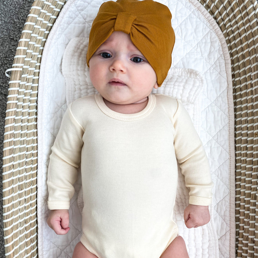 
                  
                    Knotted Turban in Butterscotch
                  
                