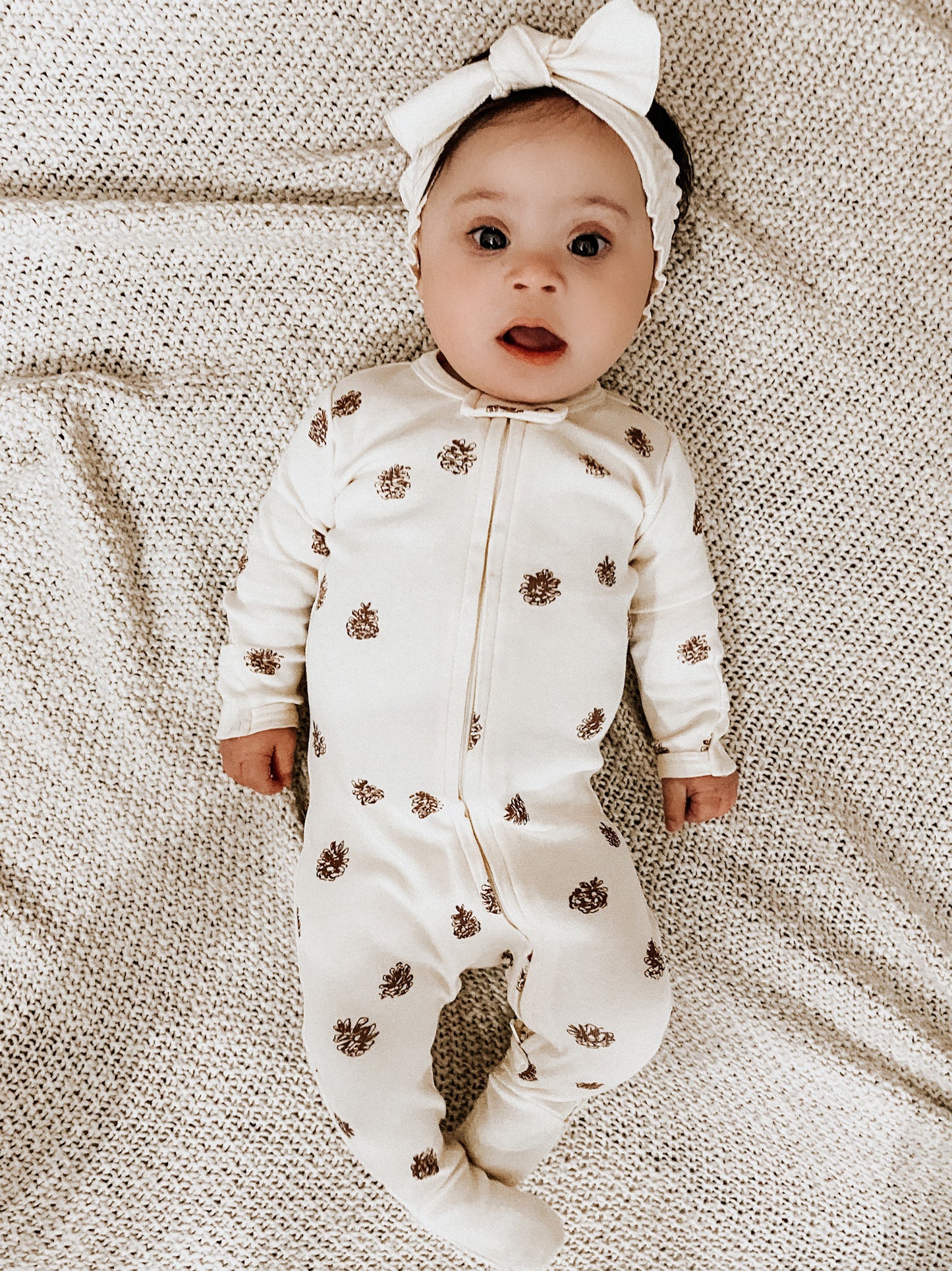 
                  
                    Organic Zipper Footie Print in Buttercream Pinecone
                  
                