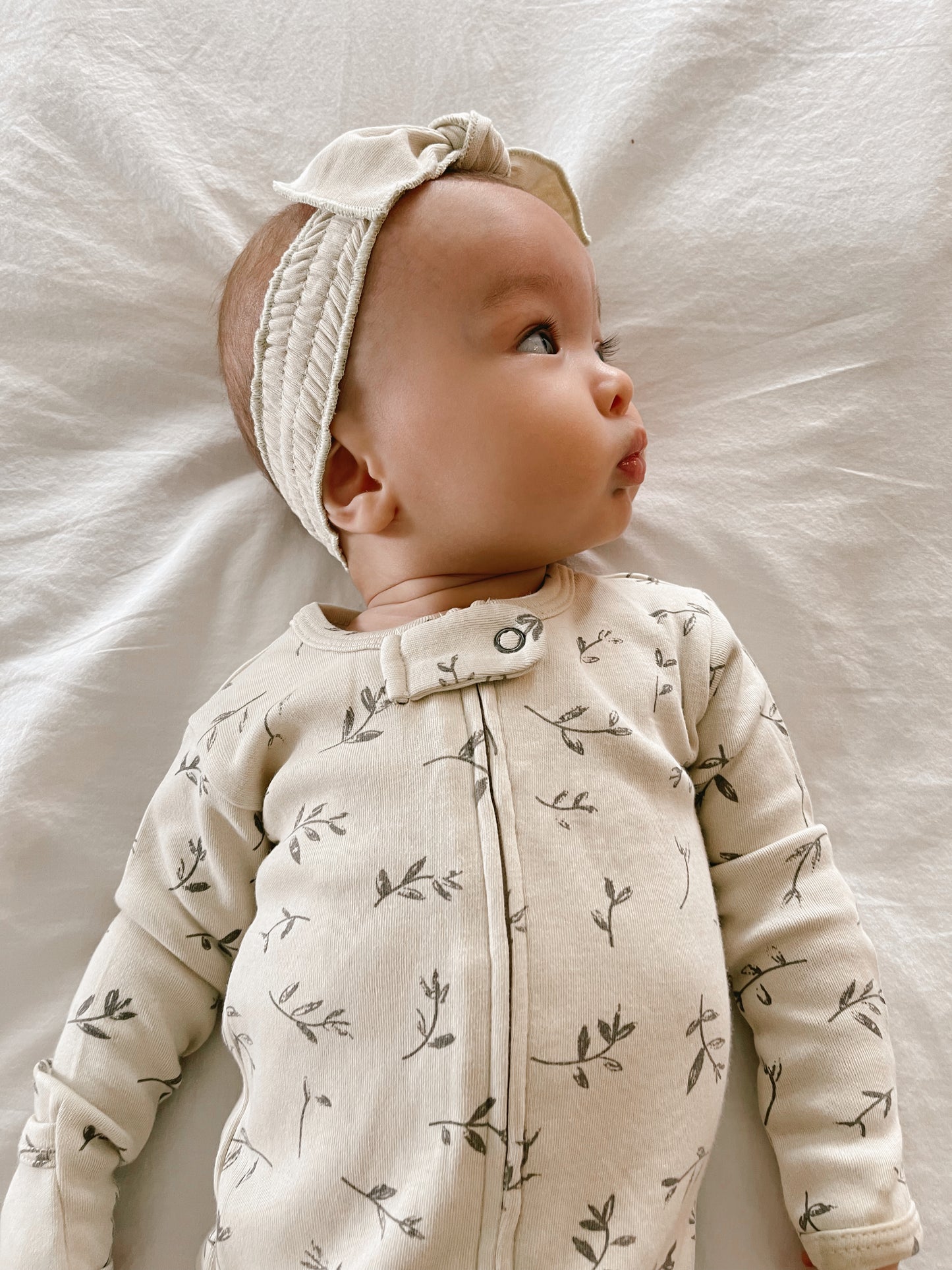 
                  
                    Organic Zipper Baby Footie in Stone Flower
                  
                