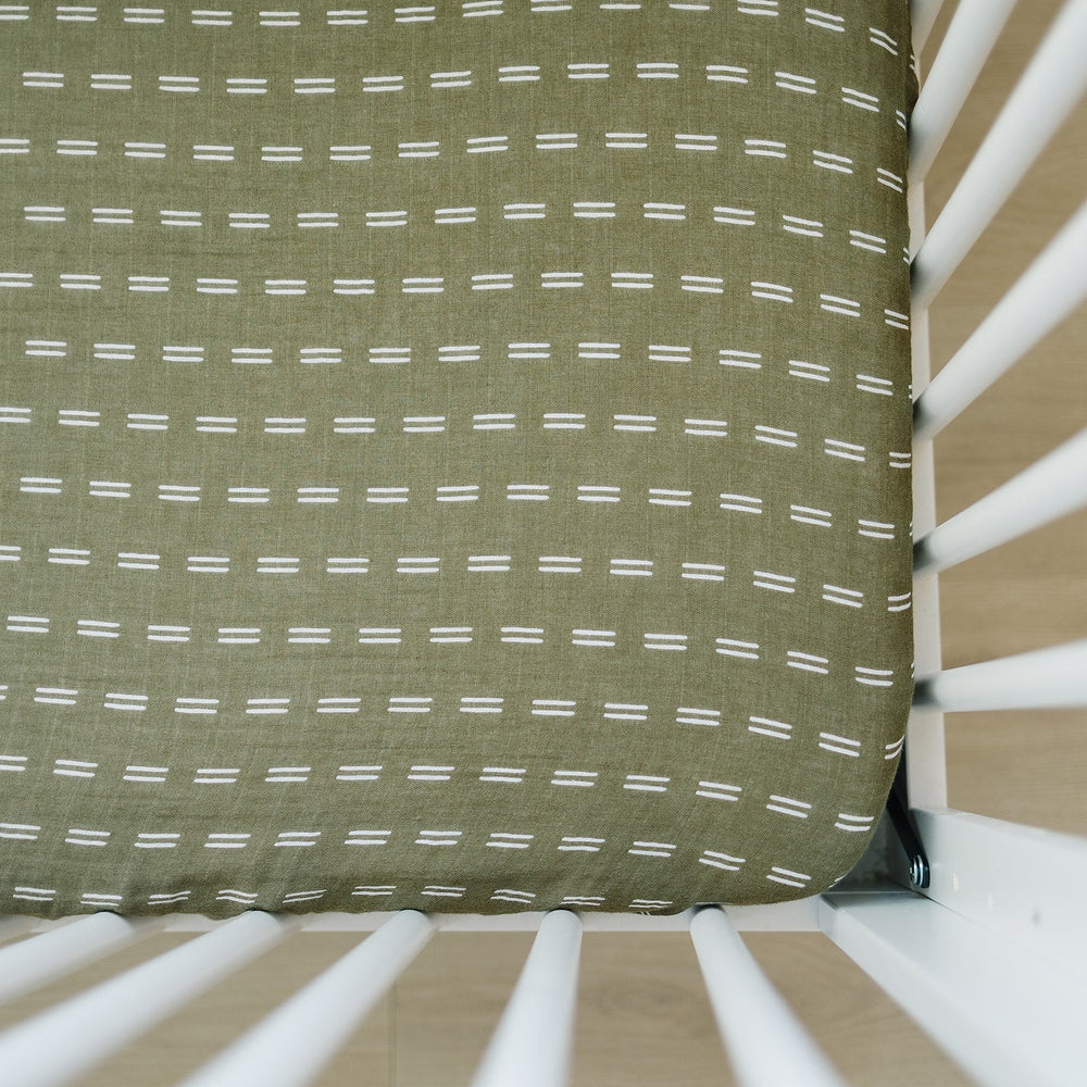 
                  
                    Olive Strokes Muslin Crib Sheet
                  
                