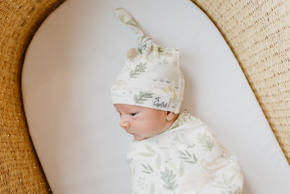 
                  
                    Rex Newborn Top Knot Hat
                  
                