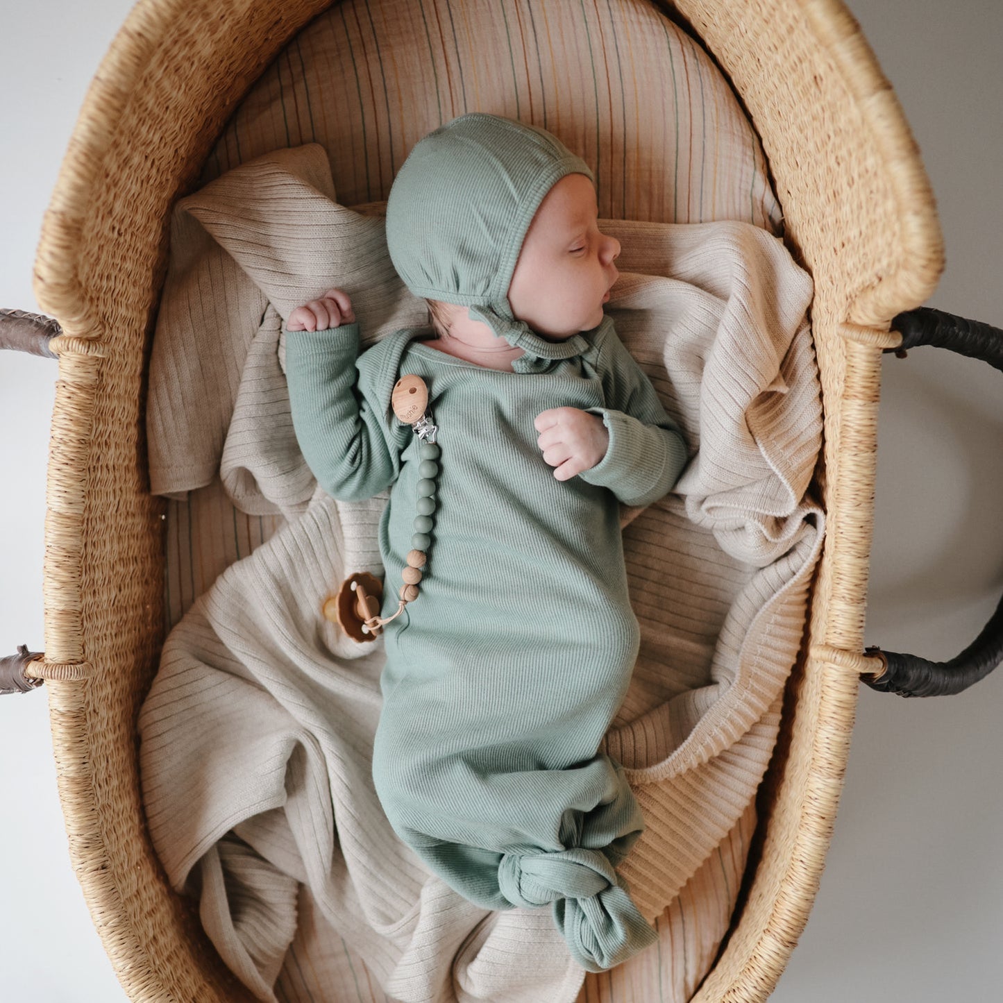 
                  
                    Ribbed Baby Bonnet (Roman Green)
                  
                