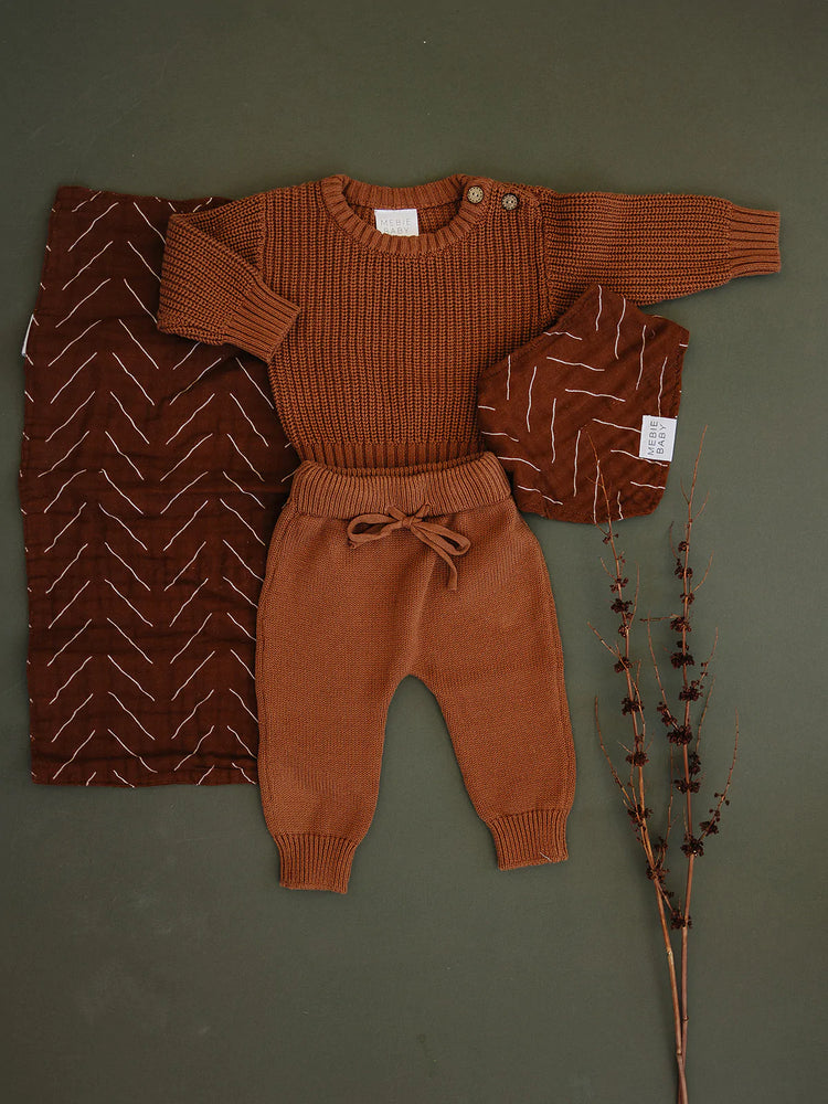
                  
                    Rust Knit Sweater
                  
                