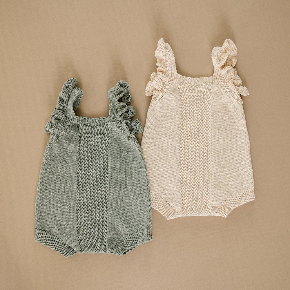 
                  
                    Vanilla Embellished Ruffle Knit Romper
                  
                