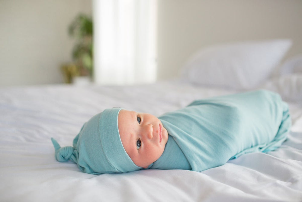 
                  
                    Sonny Newborn Top Knot Hat
                  
                