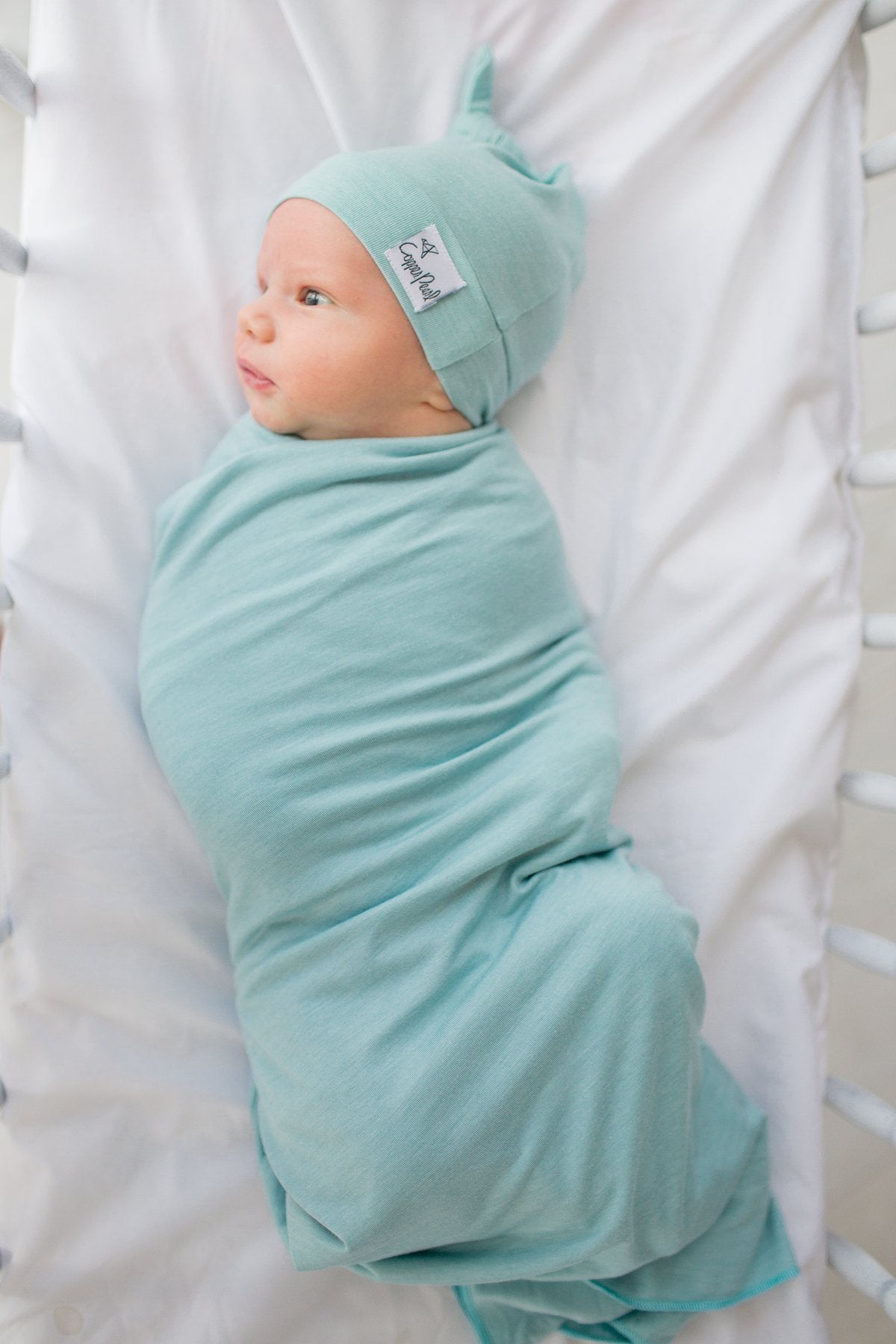 
                  
                    Sonny Newborn Top Knot Hat
                  
                