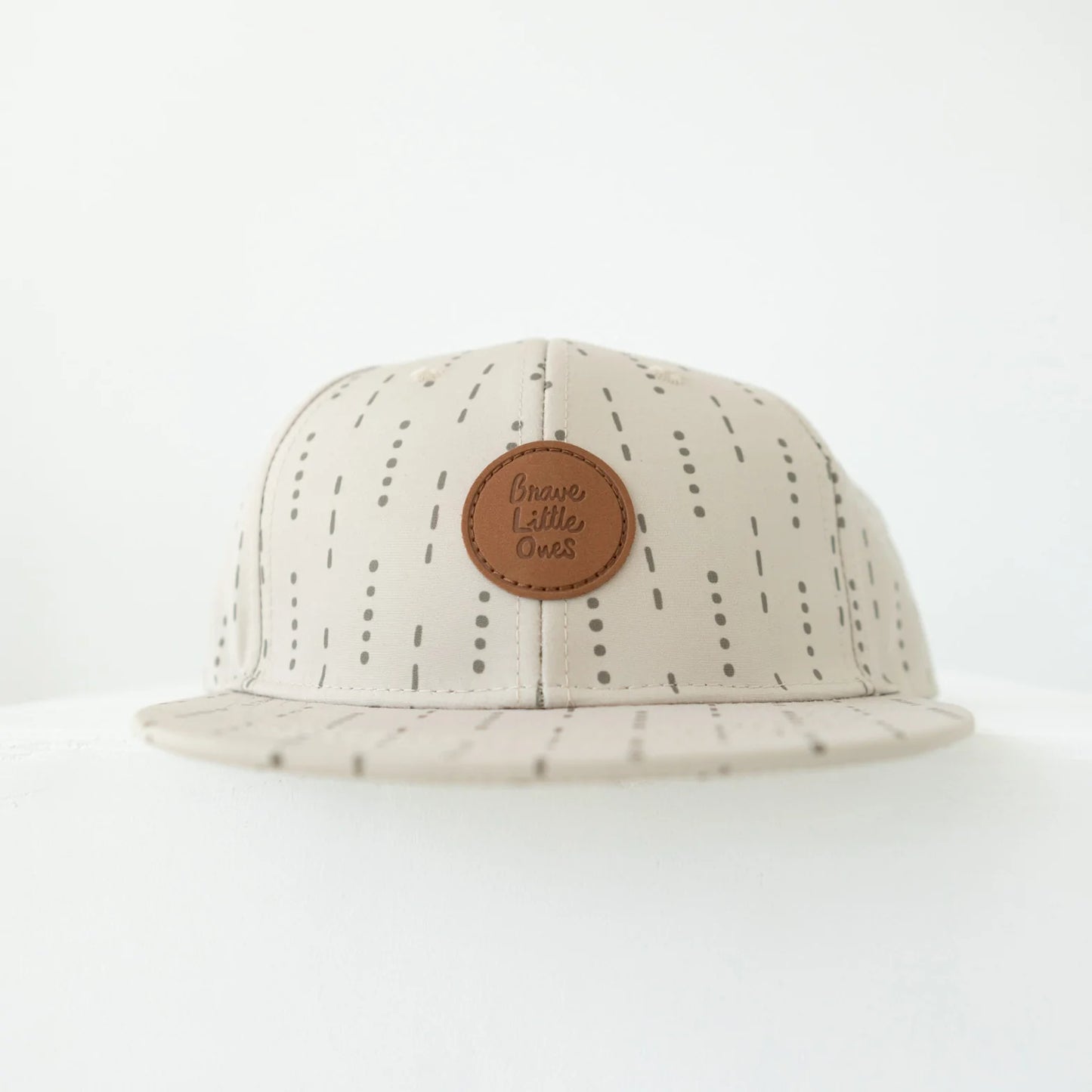 
                  
                    Taupe Lines & Dots Trucker Hat
                  
                