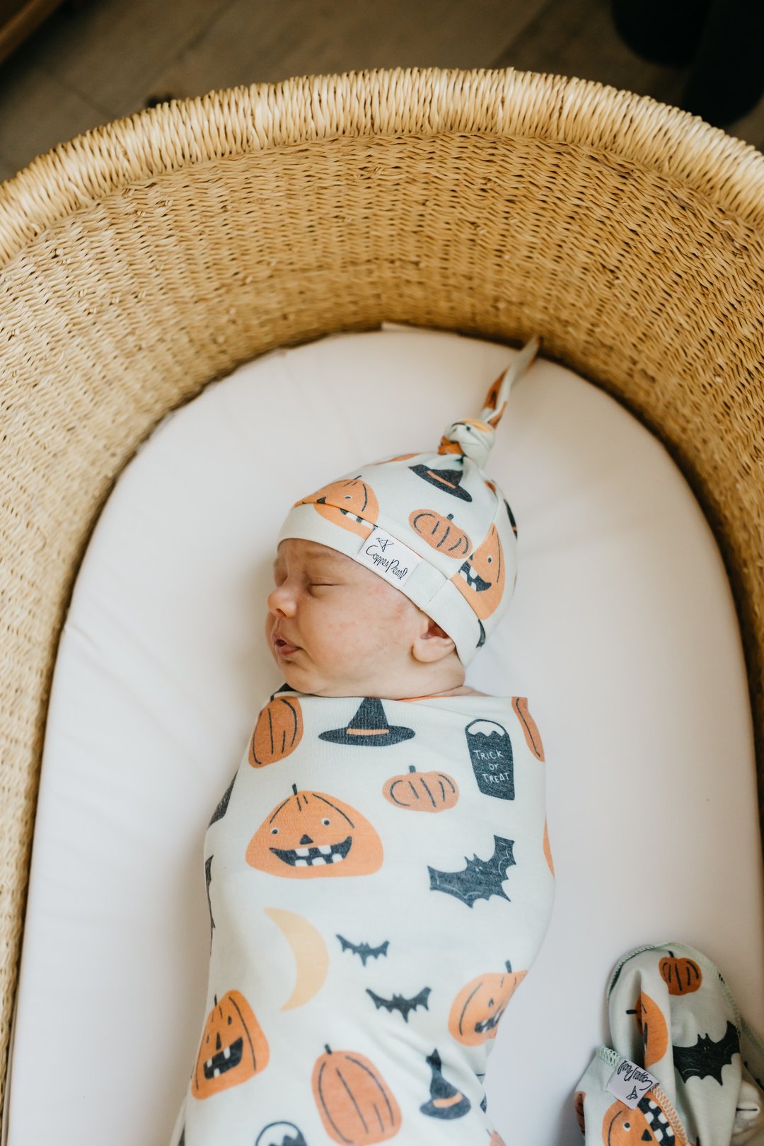 
                  
                    Trick Newborn Top Knot Hat
                  
                