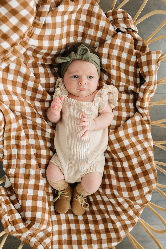 
                  
                    Vanilla Embellished Ruffle Knit Romper
                  
                