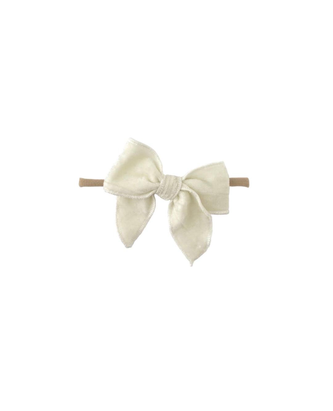 
                  
                    Edged Velvet Bow | White
                  
                